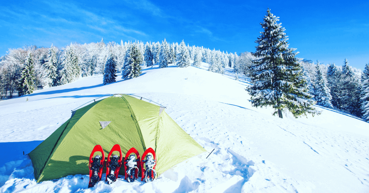 a tent on a snowy hillside