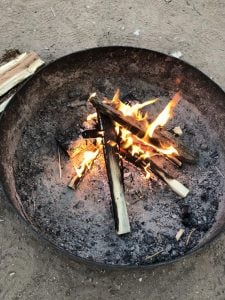 A campfire in a campfire ring