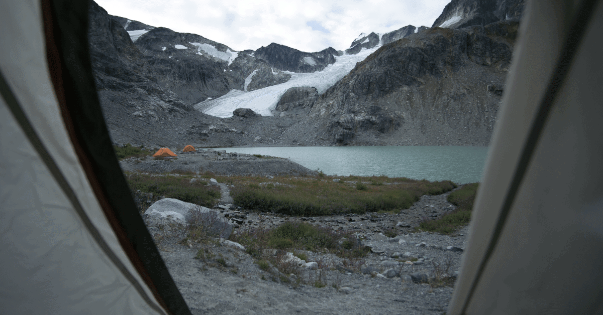 an icy landscape from the inside of a tent