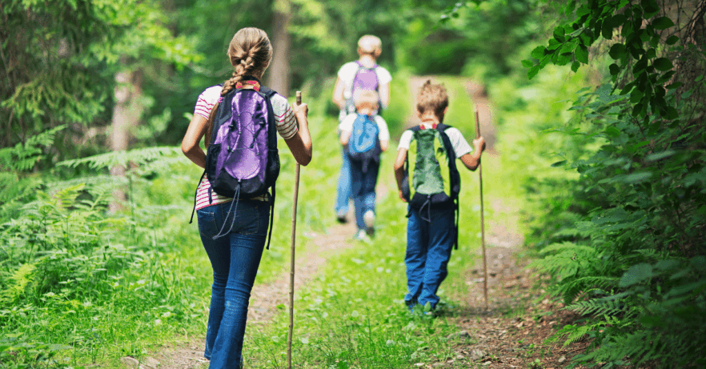 kids hiking with hiking backpacks