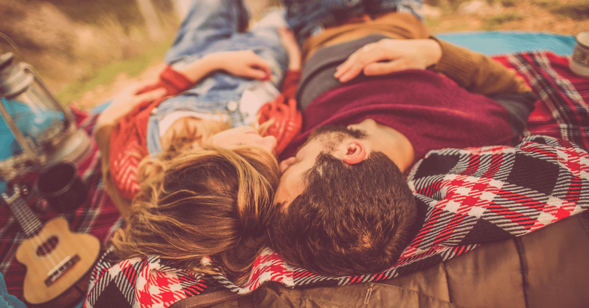 couple lying on a blanket