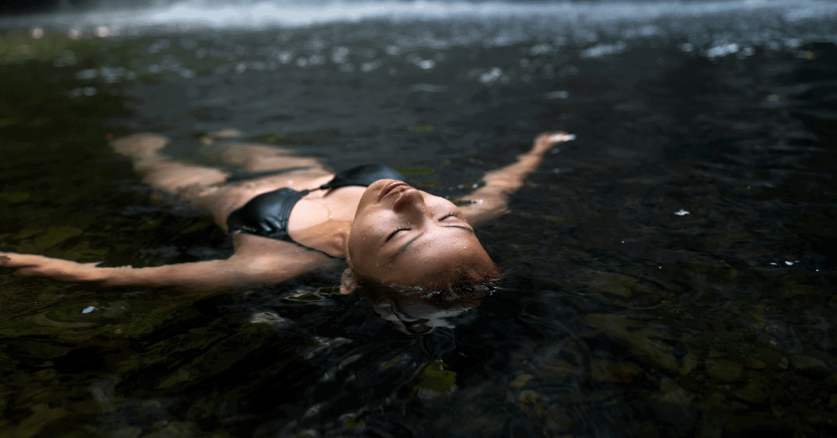 woman floating in a river