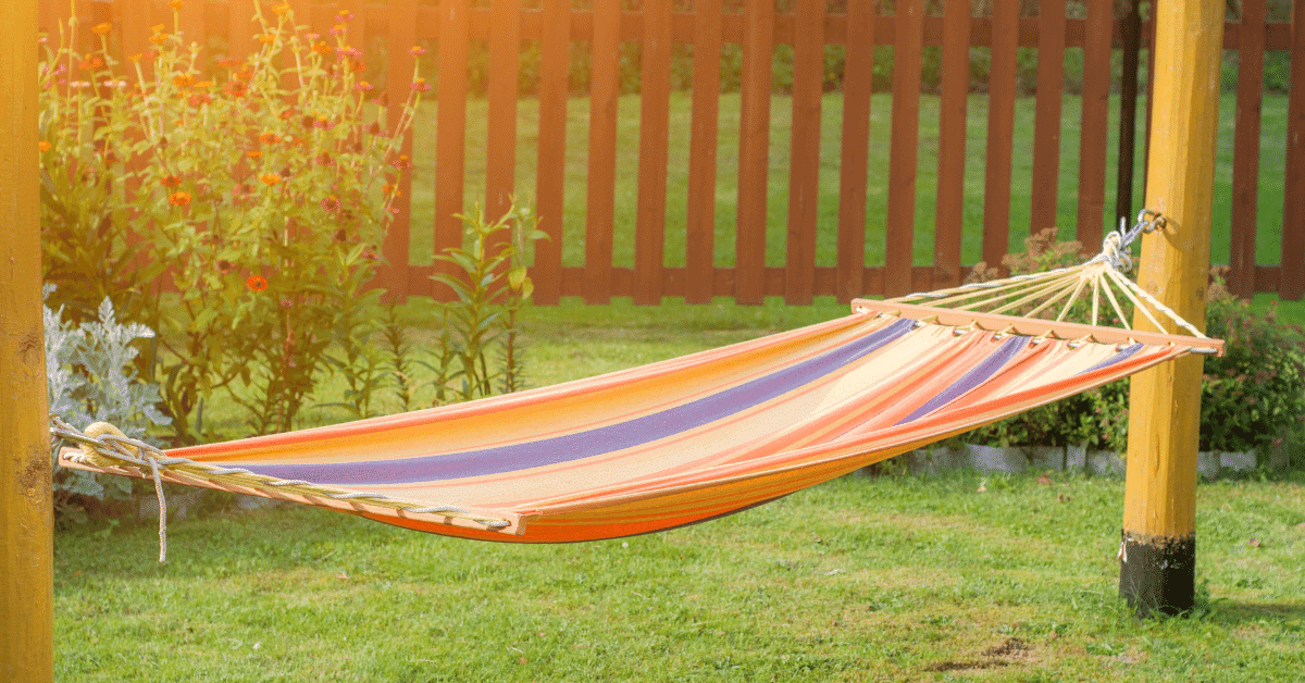 a hammock hanging between 2 posts