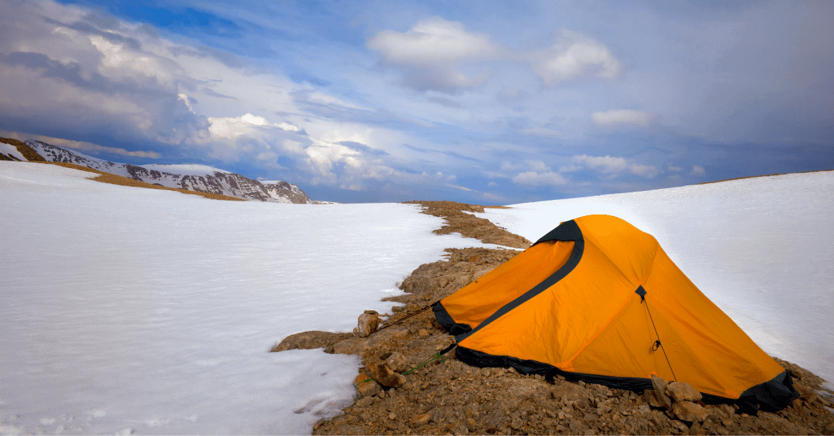 a tent in a snowy environment