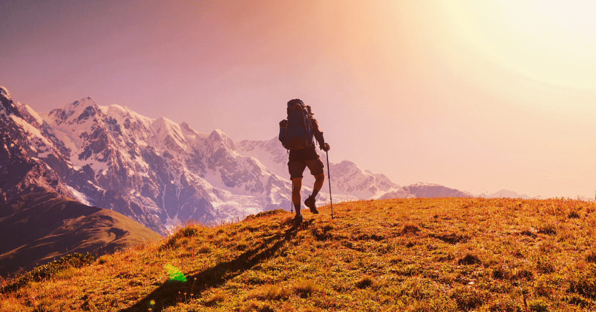 a man hiking in the mountains