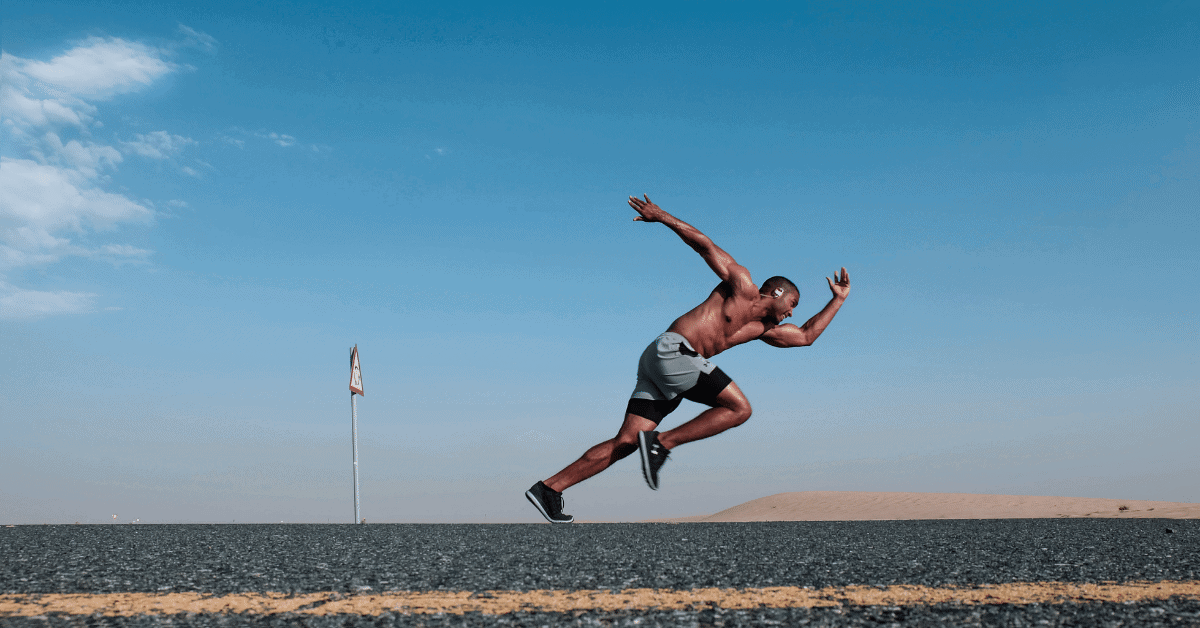 a man running on a remote road