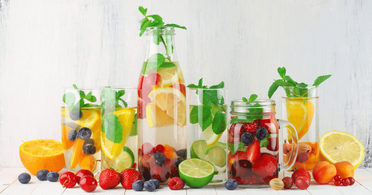 water infused with different kinds of fruit and mint