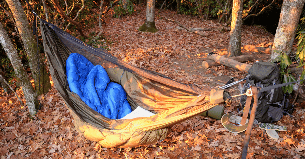 a hammock with an underquilt and sleeping bag