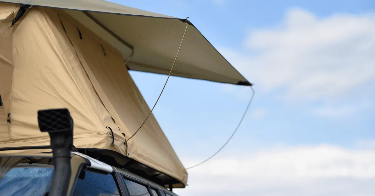 a rooftop tent on top of a car