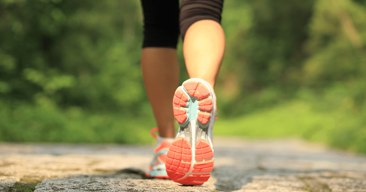 woman walking wearing running shoes