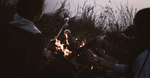 kids toasting marshmallows on the campfire