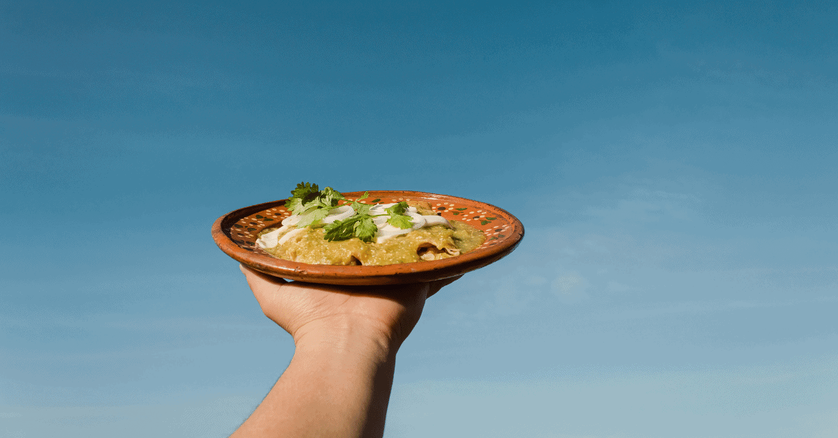 plate of enchiladas with salsa verde