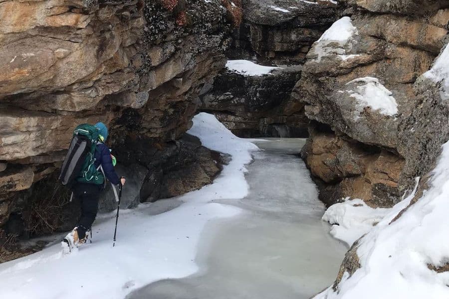 woman hiking in snow