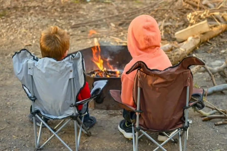 Kids gathered around a campfire