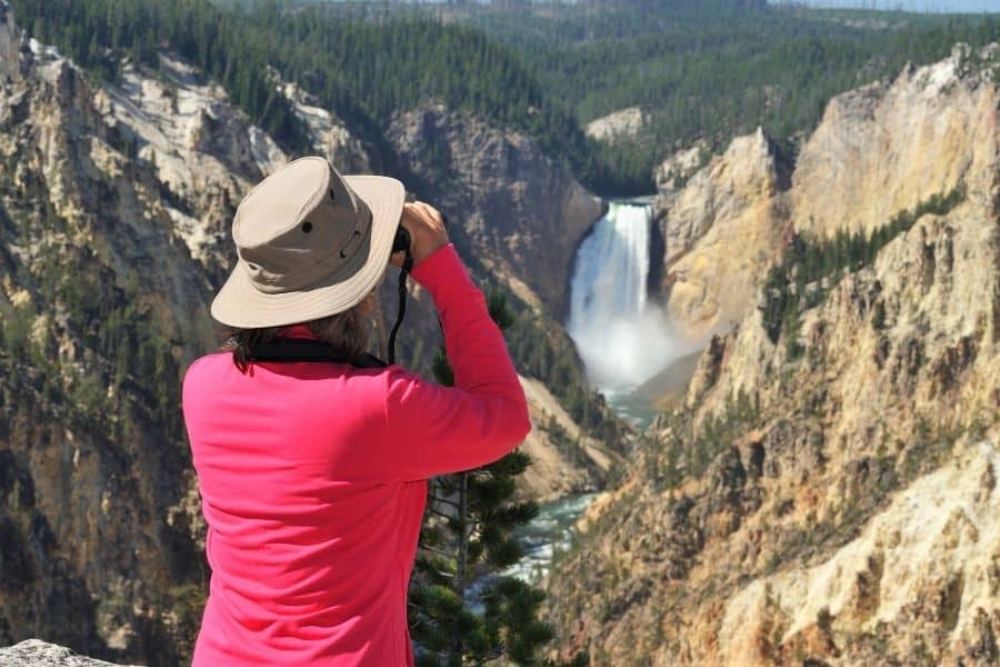 Woman using binoculars - nature sightings