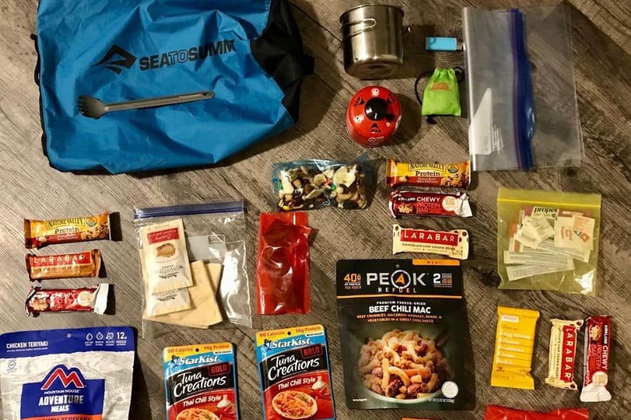 Three days / two nights of food backpacking a couple trips back. Sea to Summit waterproof food bag, titanium spork, aluminum pot, BRS stove, and MRS fuel canister. Gallon bags for trash, BIC mini, no bear hang kit because I was using bear boxes. 