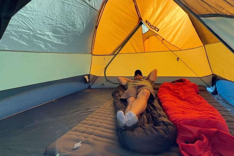 The 59 square feet of floor space comfortably fits two adults with gear