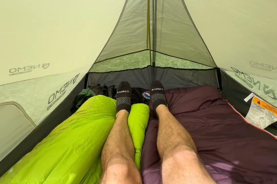 While it is technically a 2 person tent, it is a bit tight especially near the tapered 43' foot box