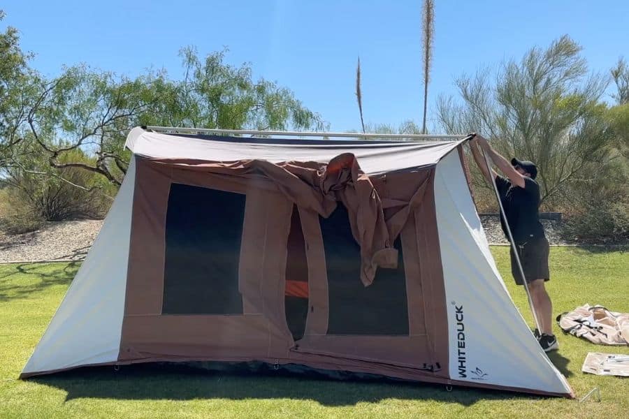 The 15 to 20-minute setup time is reasonable for a canvas tent of this size, though it is not easy and I would recommend 2 people