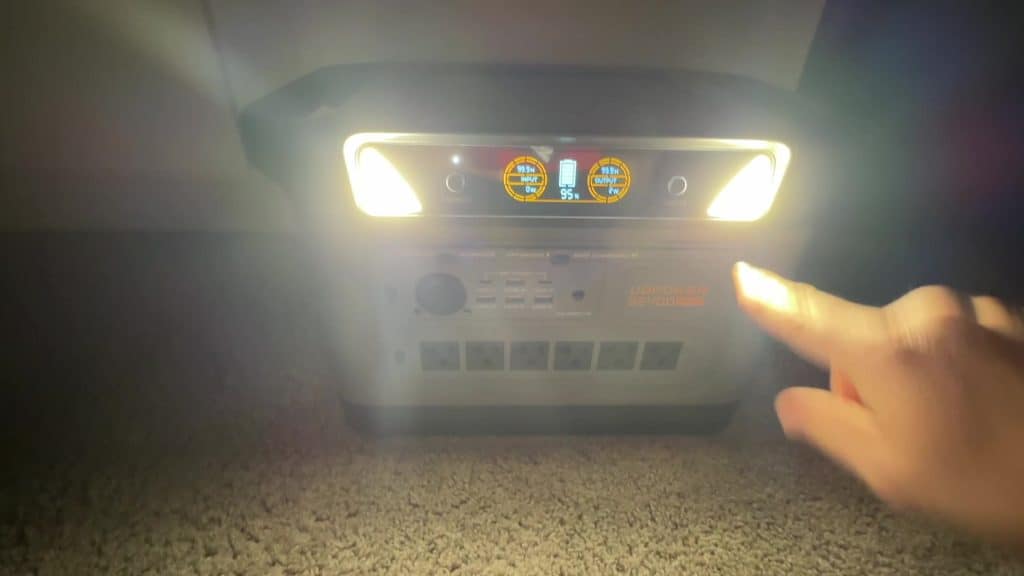 UDPower S2400 built-in LED light illuminated in a dark room showing the lantern function